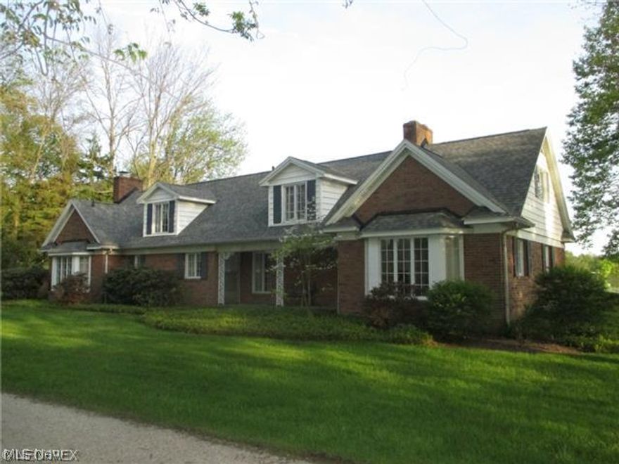 Be one of 77 lucky families to actually live lakefront at Congress Lake Club! Beautiful view of lake, clubhouse, and fireworks! Spacious brick home with some updates- new roof and well. Separate boat house. First floor master bedroom. 3 bedrooms and 2.1 baths. 2 car attached garage. Leased land. Must be a member of Club. Congress Lake Club- CLC has a Don Ross designed golf course rated one of the best in Ohio. The lake itself is a 300 acre spring-fed lake that offers fishing and pleasure boating. Tennis and horseback riding is also enjoyed.