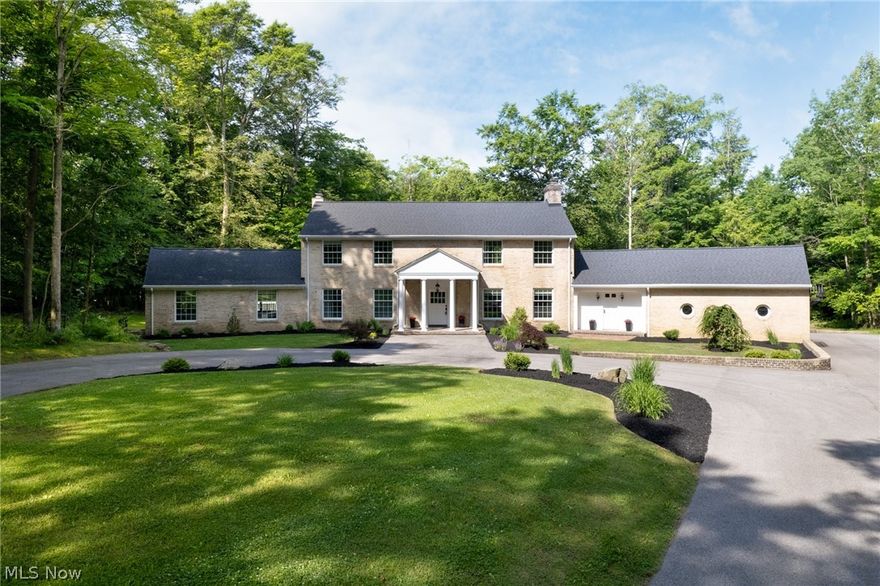 Welcome to 380 Timberidge Trail located in well sought after Gates Mills! Just past the brick pillared entrance, you will travel down the private, wooded drive to find this beautiful four bed, three and a half bath home originally built as a residence for the builder himself! This home sits on over five and a half acres of beautifully landscaped and wooded land that backs up to a creek offering ample privacy and breathtaking views. Upon entering you are greeted by an extended entryway that uniquely stretches the full length of the home and offers ample natural light throughout. As you continue to walk through you will come upon the gorgeous large formal dining room which leads you into the luxurious kitchen. The kitchen features quartz counter tops, an extended island with seating, and Bosch appliances. Additionally on the first floor you can find two impressive living spaces both with gorgeous large mantles to accent the fireplaces, and a home office with its own private entrance. Last on your tour of the first floor, you can find an over-sized laundry room and drop zone including a full bath! As you travel up the spiral staircase  you will find three bedrooms including a master suite that dreams are made of! From the luxurious master bath with soaking tub to the custom master closet, this room has it all! If that wasn’t enough, step outside and take in a beautiful Northeast Ohio sunset or invite your family and friends over for an evening on the expansive deck where you can grill out with the gas grill, or use the brick pizza oven. Lastly, but certainly not least, have guests take advantage of the large guest room which also has its own private entrance. Gates Mills Village offers loads of history, a wonderful feeling of community with family friendly events, and is close proximity to numerous amenities such as coffee shops and tennis courts. Additional features include full home generator, reverse osmosis water filter, and the basement is perfect for a rec room!