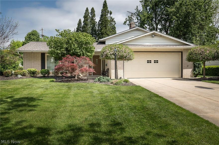 Close to shopping, dining, and highway access, this meticulously maintained Lyndhurst split-level is move-in ready! The main level of this beautiful home includes a large living area, a dining room, and a spacious kitchen that opens to a private back deck, which is perfect for entertaining or relaxing. Upstairs features a massive master bedroom with two large closets, a second large bedroom with plenty of storage space and a full bathroom. The lower level of this home boasts a sizable and comfortable living area, a full bathroom, and a laundry room that walks out to a backyard patio. In addition, the lower level features a large bonus room, which is perfect for a third bedroom or office space. Other features of this gorgeous home include an attached two car garage with lots of storage, a newer roof (2016), newer furnace and windows, an irrigation system, and attractive landscaping. Finally, the deck has recently been sealed and a new kitchen sink is to be installed prior to close. Welc