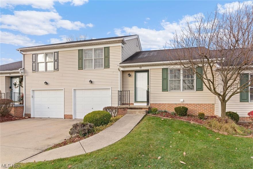 Welcome to this 2 bed, 1.5 bath cluster home located in sought after Sturbridge Commons. Enter directly into the spacious carpeted living room that boasts exposed wood beams and vaulted ceilings with skylight windows. The kitchen has plenty of storage with ample cabinetry and also features a new fridge (2023). The laundry is located on the garage level of this home and includes a utility sink. The two bedroom are on the second floor, up the beautiful wood spindle staircase. The master bedroom includes plush carpeting, a half bath and ample closest space. The second bedroom is equally spacious and shares the full bath with the master. New AC was installed in 2022. Exterior features include a fully fenced in paved patio area and 2 car attached tandem garage.