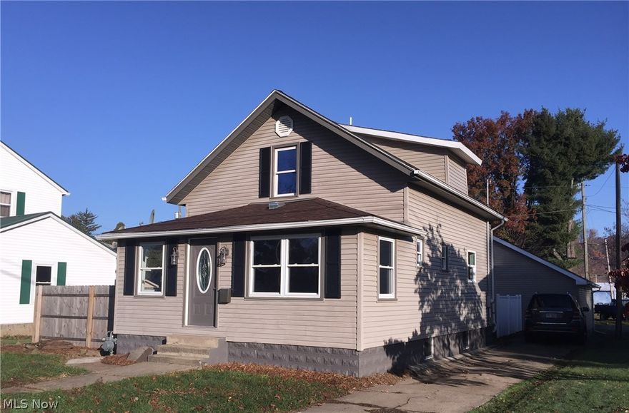 Beautifully remodeled 1 1/2 story home with 3 bedrooms, 1 1/2 baths, first floor laundry and an oversized 840 square feet detached garage. There is a brand new kitchen with patio doors out to a new back deck. The living room has a decorative fireplace and is open to a bright and airy front sun room. There is a first floor bedroom, 1/2 bath and laundry room. The upstairs has 2 additional bedrooms both with double walk in closets and there is a brand new full bathroom. There is a nice private patio area on the side of the property. This home will allow for immediate possession. Move right in and enjoy!