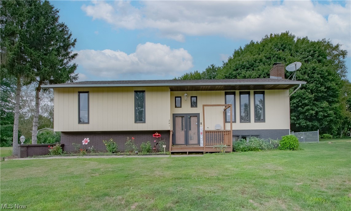 This beautiful bi-level on a dead-end street is a must-see! Featuring over 1,800 sq ft of bright living space this family-friendly home has so much to offer. Upon entering this home you’re welcomed by the open great room with vaulted ceilings, tall windows, and an abundance of natural light. The kitchen features cabinets galore, a tile backsplash, and stainless steel appliances. Adjacent to the kitchen is the dining area featuring sliding glass doors to the oversized deck. Perfect for pets and entertaining friends and family the fenced-in backyard includes a deck, a storage shed, and a detached heated 3-car garage with a workshop. 3 bedrooms and 2 full baths, including the master suite, are on the main level. The master suite has a large closet, access to the deck, and a private master bath featuring a walk-in shower, and a vanity with storage. Additionally, the lower level offers a spacious family room with a fireplace, a wood accent wall, a full-size bar great for family gatherings, and a laundry room. Completing this home is the attached 2-car garage. Updates include humidifier on furnace, hot water tank, air conditioner, fence, roof on house and detached garage, septic tank, and more. Don’t miss this home! Book your private showing today!