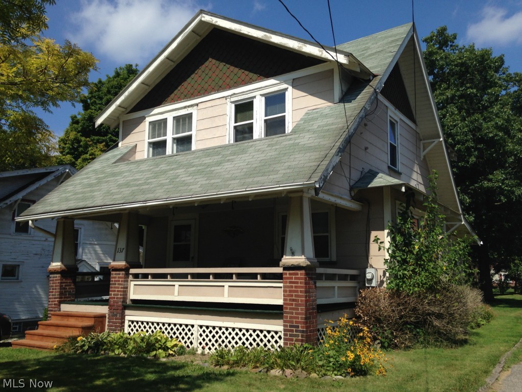 Dont miss this charming 3 bedroom home on a quiet street with the Gorge Metropark just steps out of your front door! Great neutral colors with the new carpet and fresh paint throughout. Eat in kitchen and formal dining room. Faux fireplace. Totally remodeled bathroom. 2 car detached garage. Full basement with washer and dryer hookups. Awesome front porch. This home has it all!
