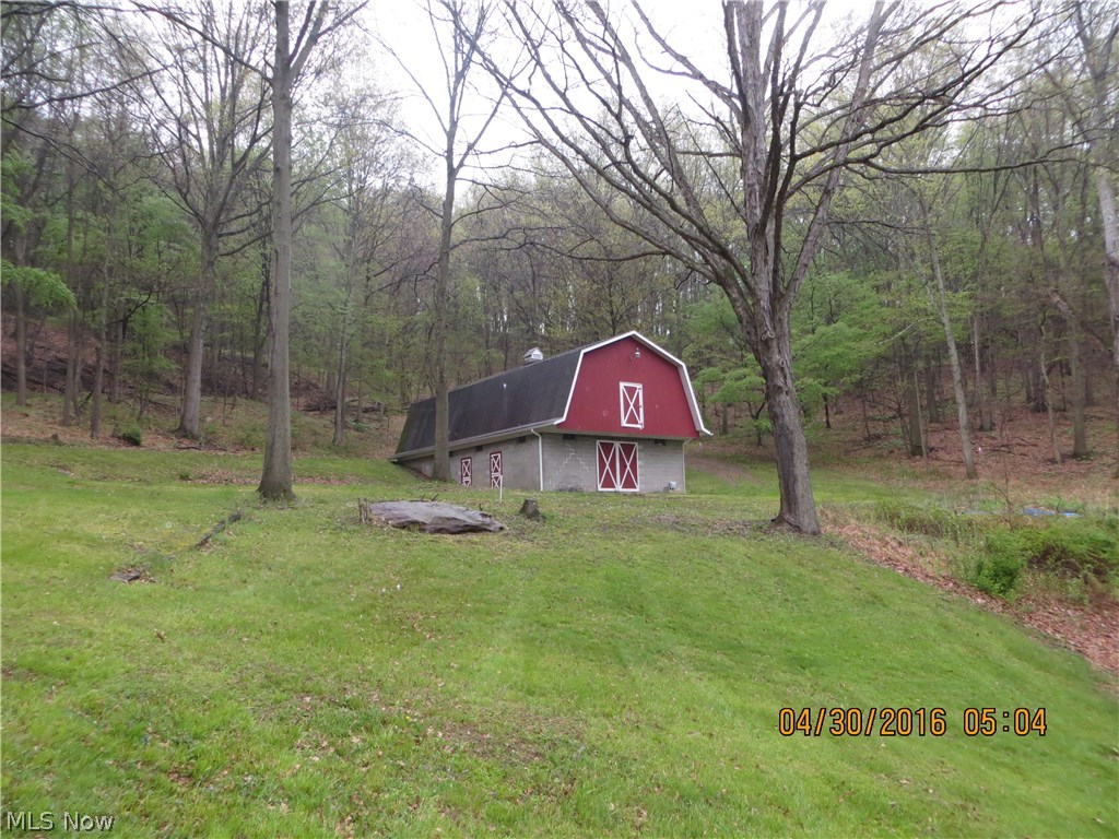 Great place to build or just a private get-a-way minutes from town with 4.5 acres. Barn has a lower section with stalls. Part concrete and some are dirt floor. The upper section has been framed in for a living space. Wired for Electric. Make it what you need it to be.