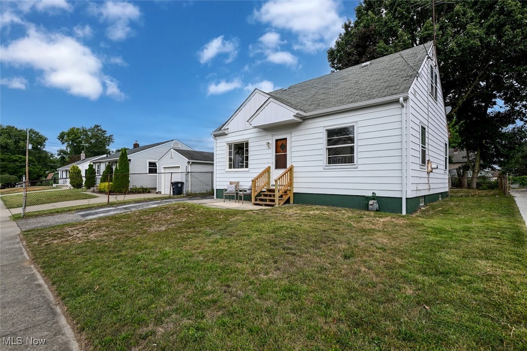 Updated and charming 3 bed/2 bath colonial in Firestone Park. This lovingly restored home features a brand new eat-in kitchen with quartz counters, stainless appliances, a farm sink, LVT wood floors, and a fantastic tile backsplash. The main floor includes an enormous living room, two spacious bedrooms all with new carpet, and a charming bath, where classic tile blends with modern accents in the custom shower. Upstairs, you'll find a versatile bedroom with a built-in headboard/desk combo, built-in dressers, and abundant storage. The immaculate basement offers a rec room, shower stall, toilet, and laundry area. The oversized garage provides extra storage that could be used as a man cave, workout room, or converted to a patio overlooking the beautiful backyard trees. Walkable to Voris School, shopping, and restaurants, with convenient access to major highways. You are going to love calling this home!