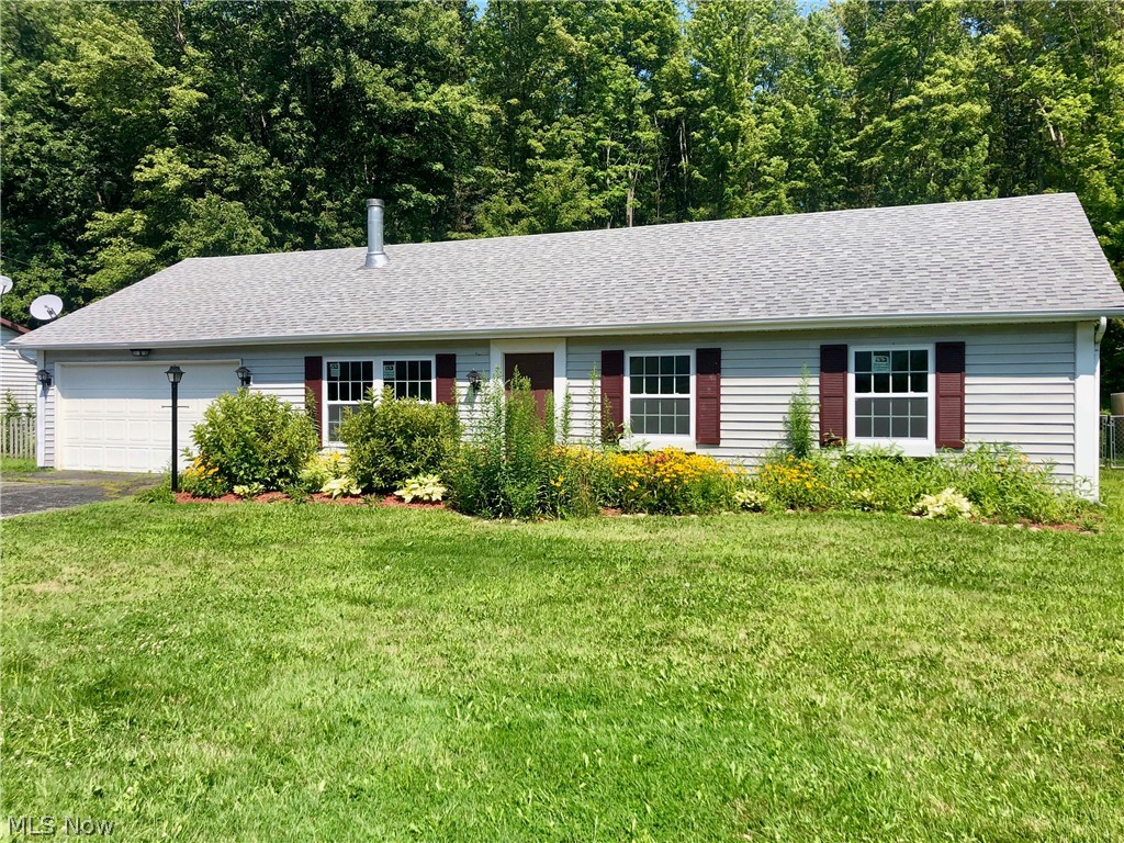 Completely remodeled ranch home close to Lake Erie. Nearby golf course, parks and lake access. New roof, windows, carpet, laminate flooring and light fixtures throughout. Beautiful bright kitchen with white cabinetry, solid surface counter tops and stainless steel appliances. Gorgeous stone wall fireplace with built in cabinets. Fresh neutral paint throughout. Seller is motivated - bring all offers!