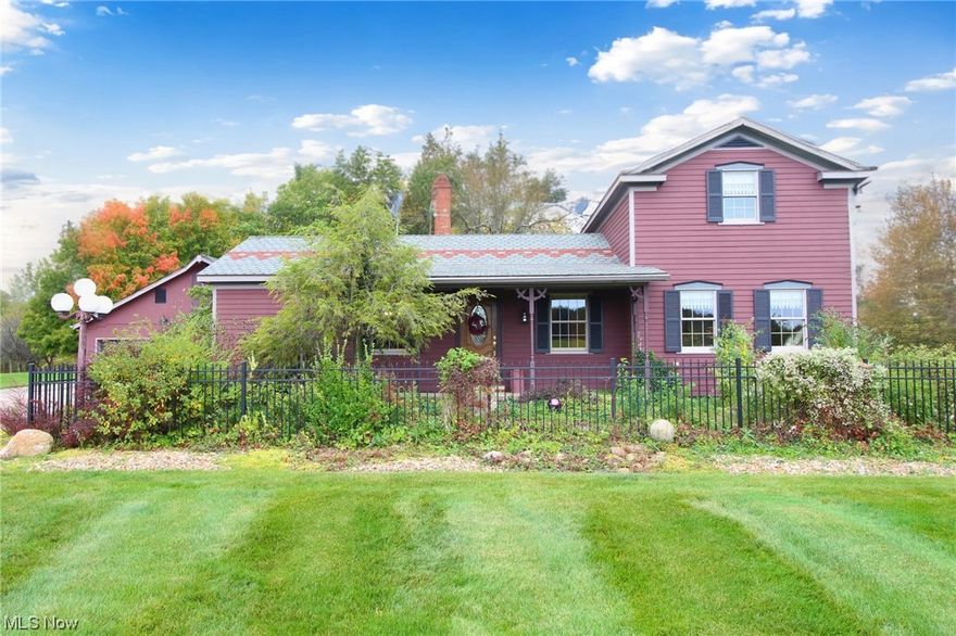 Welcome home! This quaint colonial looks like a century home from the road but was built in 1976*Stroll over the paver pathway up to the expansive front porch, perfect for rockers where you can experience the sun rise in the mornings, many perennials and lush ground-coverings*Through the pretty front door is the formal living and dining rooms*The kitchen comes fully equipped in addition to having a reproduction, wood-fired stove that gives off tons additional heat for coming winter temperatures*The large mud-room hosts the washer and dryer*The décor matches the style of the home and all 4 bedrooms do not disappoint*The owner's bedroom measures 16 x 15 with 2 large closets and recently updated 1/2 bath*The substantial main bath and 2nd bedroom round out the first floor*Bedrooms 3 and 4 are charming with sloping ceilings*NOW...let's talk about that 52x36 outbuilding with heat, a/c, cement floor throughout, commercial electrical applications, 2nd floor over the 3-bay car area and city water to the building which has possibilities as additional living quarters. Situated on 4 acres, this parcel can be subdivided the historic shed was once on the Medina Square and will convey to new owners.