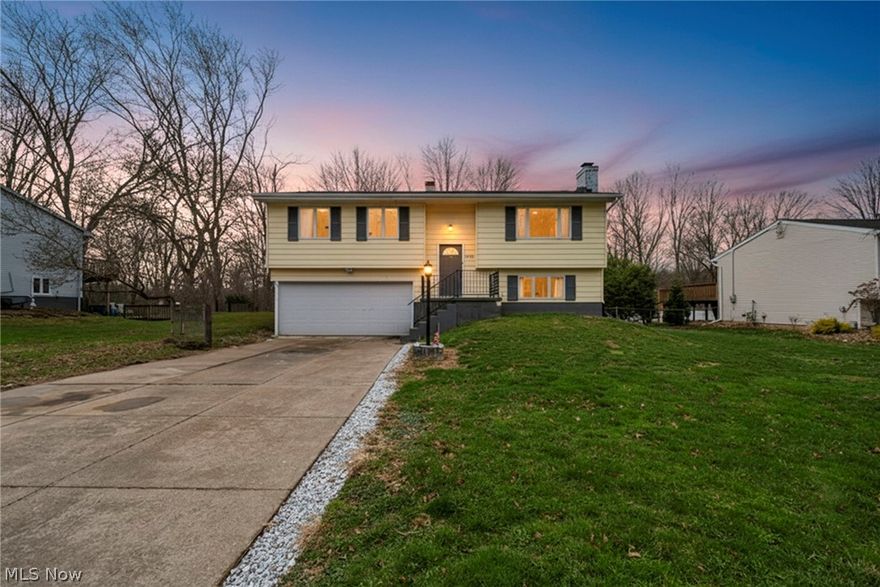 Welcome home to this move-in ready bi-level located in the highly desirable Manchester School District.
The main level offers an open layout with a recently remodeled kitchen featuring granite countertops, stainless steel
appliances, LVT flooring, and an island with a breakfast bar perfect for everyday living or entertaining.
Right off the dining area, French doors lead out to a large deck overlooking a partially fenced backyard, while the
oversized living room windows bring in plenty of natural light. You'll find three bedrooms on the main floor, all with ample closet space. The lower level gives you flexibility with a spacious recreation room, complete with an electric fireplace, ideal for a
second living area, office, or entertainment space. There's also a convenient half bath and a bonus room with walkout
access to a covered patio. Out back, enjoy the open yard and firepit, perfect for relaxing evenings or having friends over.
Located close to schools, shopping, dining, and Portage Lakes State Park. If you'd like to take a look or have questions, feel free to reach out.