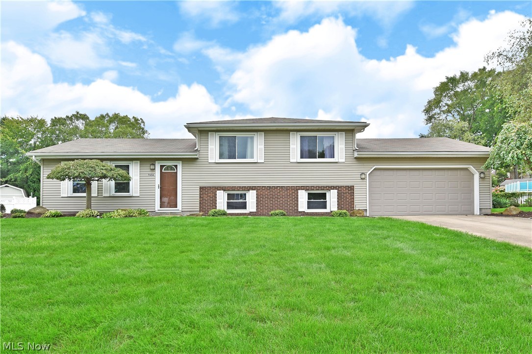 Sitting in a quiet cul-de-sac in a great Boardman neighborhood this split level home has a lot to offer. Walking in you see the home offers a nice open floorplan that makes family time and entertaining a breeze. The kitchen with a center island and all appliances included looks out into the living room and dining room. On the second floor you'll find three nice size bedrooms and a full bath. Heading to the lower level of the home you find a very spacious family room, half bath and utility room. Oversize 2 car garage with additional storage space. Relaxing covered patio nice for a cookout or an evening to unwind. Updates include freshly painted interior (9/22), new lighting (9/22), HWT (4/19), C/A (8/18).