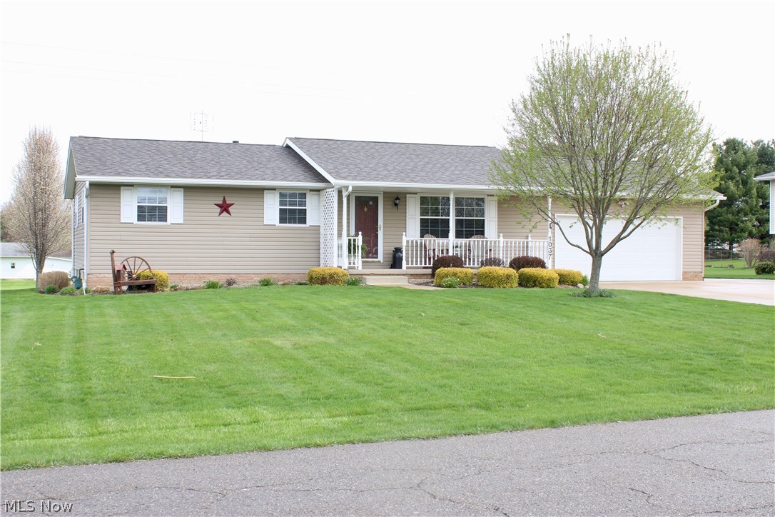 Amazing Lake Township Ranch! Move in ready at it's best. The list huge list of updates starts with new carpets, ALL NEW kitchen, new molding and baseboards throughout, new interior & exterior doors, main floor bathroom, first floor laundry, hardwood floors, family room addition, deck, detached garage, driveway, A/C & furnace, 200 amp electrical service, sump pumps, windows, siding and roof! No details were missed, especially in the stunning kitchen. The endless custom cabinets are all soft close, tons of Corian counter tops, classic pressed metal backsplash, working wood burning fireplace with brick and custom mantel and all appliances stay. The original kitchen has been converted to a very convenient 1st floor laundry area. The family room is the place to be! Huge, yet cozy space over looking the freshly coated deck and expansive green lawn. Retractable screen between kitchen & family room. Ceiling fans in most rooms. Wait, there's more in the basement! Beautiful fireplace,
