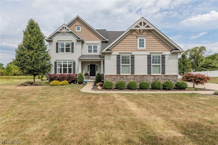 Stunning 5 bedroom, 3.5 bath Colonial situated on a private 1 acre property on a quiet cul-de-sac street in the prestigious River Trace Estates of northern Medina! This home showcases an abundance of must have upgrades, a 3 car garage, full finished basement, spacious open floor plan & amazing backyard with a pool! Elegant arched doorways, custom woodwork, charming wall niches, updated lighting & warm wood floors are found throughout the main level. Welcoming 2 story foyer opens to the lovely living room with modern accent wall. The open main living area is complete with a family room w/ faux wood beamed ceiling & updated fireplace, adjoining eat-in kitchen w/ sprawling island w/ seating, gorgeous granite countertops, walk-in pantry, included appliances, subway backsplash & breakfast area. Overnight visitors will appreciate the main floor guest suite with full bath. Off the 3 car garage is a mud room w/ a bench seat/organizer. The gracious staircase takes you upstairs where you will find the luxurious owner's suite with double tray ceiling, huge walk-in closet, and deluxe bath with expansive double sink vanity & custom tiled walk-in shower. 3 more comfortable bedrooms all with walk-in closets, ceiling fans, updated vinyl flooring & a shared bath with double sink vanity. The convenient laundry room w/ barn door, rounds out the 2nd level. The whole family is sure to enjoy the full finished basement(2020) that offers a media room w/ fireplace, custom wet bar, game area, salon room, gym & 1/2 bath. There's also an outdoor covered living area stepping down to another large patio(2017) w/ stone outdoor kitchen(2021), 30 ft above ground pool(2018) with sun deck(2018) & nice sized yard w/ custom storage shed(2022). Conveniently located near shopping, restaurants & golf. This amazing home has too many updates to list and is sure to check off all the boxes! A true must have home!