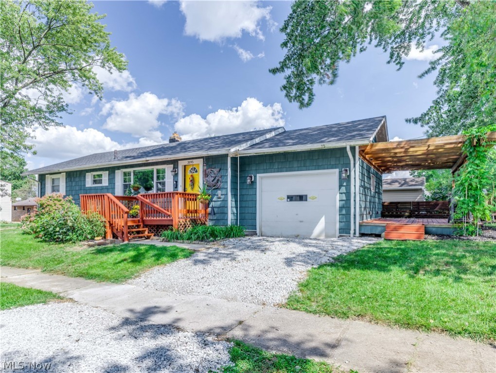 Terrific 3-bedroom ranch located minutes from Portage Crossings and shopping, eateries, and entertainment of the newly developed Front Street Area! Plenty of updates in this home! Kitchen, remodeled in 2015, offers a large eating area, top-of-the-line cabinetry with soft close doors and pullout shelving, ample counter space and trendy laminate flooring. Stove, refrigerator, and dishwasher are also included. The laminate flooring in the nicely sized formal living room was added in 2020 along with fresh paint in 2021. Two of the bedrooms are carpeted but there is hard wood underneath. The third bedroom features hard wood flooring. HVAC was replaced in 2015, roof 8/2021, and basement waterproofed in 2019. Windows have all been replaced at some point and vinyl siding installed. Transform the full basement into a rec room for additional living space. The attached garage and large side deck are other important aspects of this tremendous ranch. Been looking for one floor living!!!! Look no fu