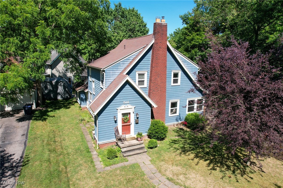 Welcome home to this Dutch Colonial at 516 Roslyn Ave– Your West Akron Sanctuary.
This beautifully updated single-family home is set on a corner lot and perfectly blends comfort, charm, and community. Enjoy Schneider Park and JE Good Park golf course within walking distance. Popular Highland Square and downtown Akron are just a five minute drive.
Upon entering the front door, you’ll find a vestibule with 2 generous closets. The spacious living room features a working wood-burning fireplace with an electric insert, creating an inviting gathering spot for family and friends. You’ll find new luxury vinyl plank floors connecting the living rm, dining rm, kitchen, and sunroom. The kitchen boasts a large peninsula, quartz countertops, and stainless steel appliances. The kitchen connects to the new half bath and laundry, as well as the mudroom, and 2-car attached garage. From the kitchen, you also have access to the large basement, another half bath and additional laundry. The dining room leads to the covered side porch, sundeck, and expansive fenced yard for a private retreat. Original hardwood lines the stairs, hallway and 3 bedrooms on the second floor, the full bathroom includes a spacious closet for extra storage, complemented by charming original built-in closets in the hallway.
Why You’ll Love It Here:
• Ideal location – easy access to major highways, fun neighborhoods, and the mall
• Updated & turnkey – new kitchen cabinets, countertops, and first floor half bath and laundry
• Large fenced yard with play structure – perfect for relaxing or entertaining
Attached 2-car garage – stay out of the elements when coming and going