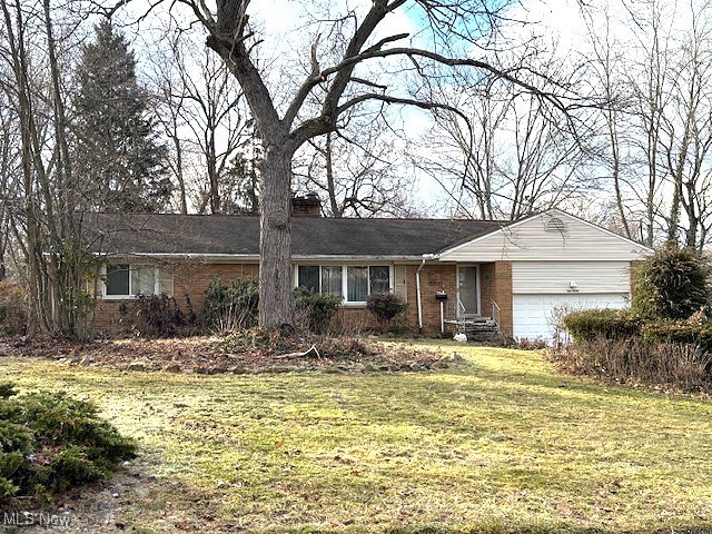 Here's your opportunity to buy into a well established, west Akron neighborhood of well maintained and more expensive homes. This
three bedroom, 2.5 bath ranch offers an expanded living room with fireplace and wall of windows to let in the morning light, eat-in kitchen with attached garage and an attached- enclosed porch that leads to the back yard and patio. The lower level has a large 38x14 Ft. recreation room with 2nd fireplace and the other half of this level is ample storage, half bath and laundry. The home has many newer windows and the furnace & water heater appear newer as well. Your personal touches & renovations (mostly cosmetic) will be needed to transform this into a very comfortable home. The lot size is somewhat irregular and there is not much of a back yard so take that into consideration when adding this home to your list. Additional photos are available per request.