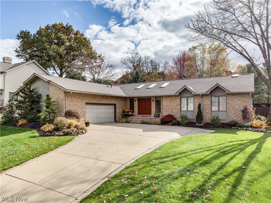 Absolutely stunning soft contemporary ranch located in Aldawood Hills with access to Portage Lakes; offering 3 bedrooms, 3.5 baths, approx. 3418SF including lower level & garage wide enough for 3 cars (approx. 28x22)* Beautiful décor & open floor plan, ideal for entertaining plus numerous updates* Vaulted entry with open staircase to lower level, skylights & ceramic floor* Vaulted great room with brick gas log fireplace & triple glass door to deck* Formal dining with slider to patio* Wonderful eat in kitchen offering corian counter top, stainless appliances (except DW), island/breakfast bar, skylight, pantry & tile floor* Vaulted master with slider to deck with hot tub* Lovely master bath updated 2013 w/tile shower, double vanity with granite counter top, skylight & tile floor* 2 additional bedrooms and updated guest bath with heated tub (2011) w/granite counter top* 1st floor laundry with cupboards, sink, built in ironing board & tile floor* Outstanding lower level open & spacious wit