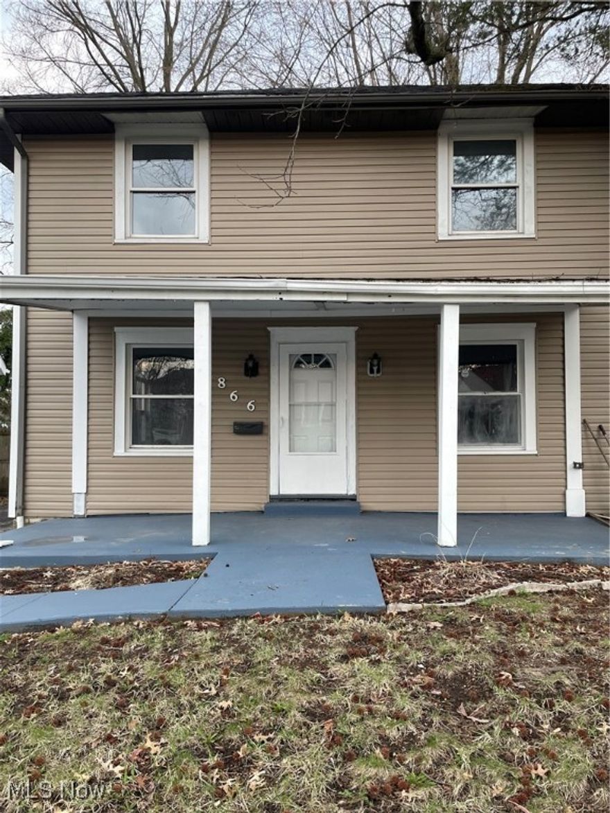 Great investment in West Akron.  This Colonial home offers 3 bedrooms, 1.5 baths, formal dining room, living room w/fireplace, split entry from living room & dining room to 2nd floor, kitchen with nook.