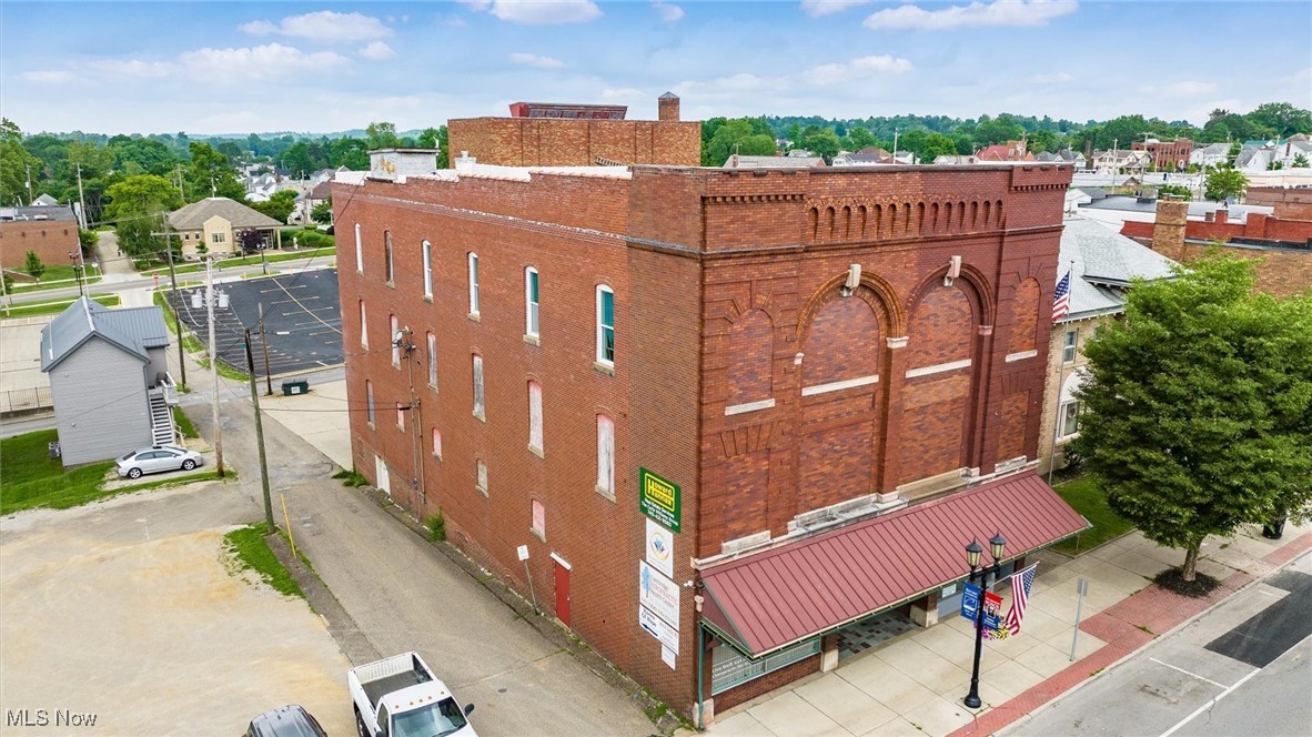 Unlock the potential of this exceptional commercial property located in the heart of historical downtown Cambridge. Centrally located within minutes to the Guernsey County Courthouse, major banks, popular restaurants, and all the amenities of the central business district. Each level holds its own unique range of uses. Suites range from 140 square feet to 3616 square feet. Ideal for professional firms, co-working spaces, or investment opportunities, this dynamic building supports a range of business models and growth strategies. All leases are gross lease helping with simplicity ranging from $200 to $2000 per month. On-site parking adds significant value - an invaluable amenity. Don’t miss out on the chance to elevate your business in a prime commercial setting!