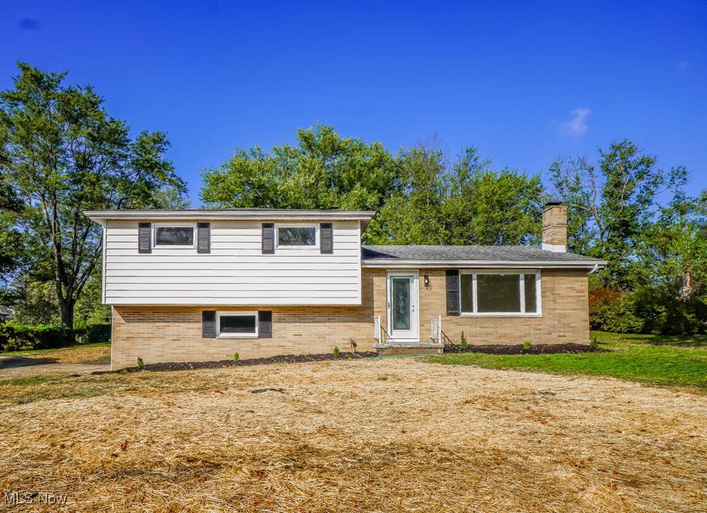 You’ll feel right at home in this updated 3 bedroom, 2 bath split level on a half-acre lot in Canton Local Schools! New flooring, lighting, and paint give every room a fresh look. The living room is filled with natural light from a large picture window and flows into the dining area and kitchen, complete with an island, subway tile backsplash, stainless steel appliances, and sliding doors to the backyard patio.
Upstairs, three comfortable bedrooms with new carpet share a beautifully remodeled full bath with a tiled tub and shower surround. The lower levels add even more living space, starting with a rec room that’s perfect for an office or hobby room, plus a second full bath with a step-in shower. A few steps down, the family room with a fireplace and new carpet is a cozy place to relax.
Outside, the concrete patio overlooks a large yard with mature trees, while the one-car garage and driveway provide plenty of parking. Notable improvements include a waterproofed basement and a brand new septic system, giving you even more to appreciate about this home.
With modern updates, flexible living areas, and a great location, this home is ready to welcome its next owner. Schedule your showing today!