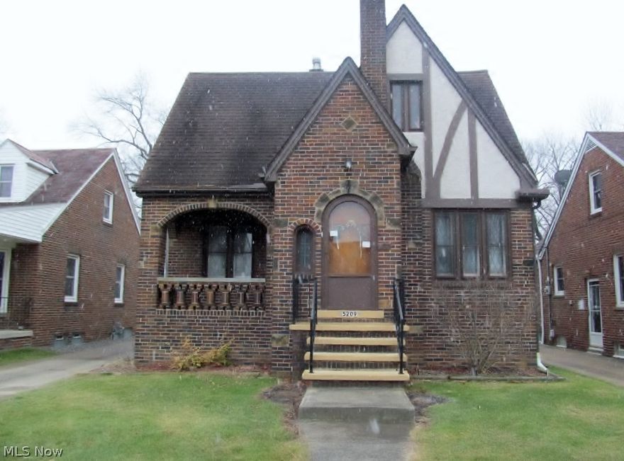 Be first or be sorry! Brick Beauty! Incredible charm and character. True in-law suite with separate entrance and utilities, or live in one and rent out the other. Living room Boasts stone fireplace. Formal dining room features built in china cabinets. Large eat in kitchen. Sun room off Master bedroom. Basement has 3 storage rooms, laundry room and glass block windows. Hardwood floors under carpet. Neutral colors. 2 car brick garage. Hot water tanks 2016 & 2015. Breaker boxes 2013. Garage door 2011. Furnaces 2006. Roof approx 2004. Central air in lower unit only. Loads of storage. Fenced yard. 1 year HMS Home Warranty.
