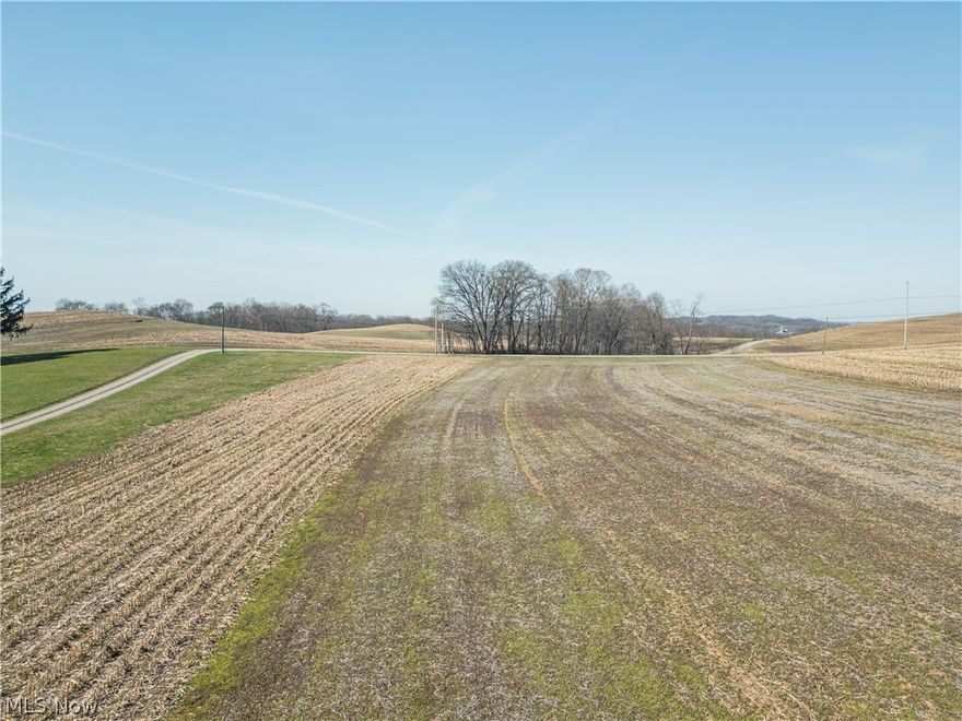 Parcel 10 - This improved tract includes the historic bank barn and attached free stall barn, offering substantial agricultural infrastructure. The buildings provide excellent storage, livestock, or equipment space, making this parcel particularly attractive for farming operations or hobby agriculture.