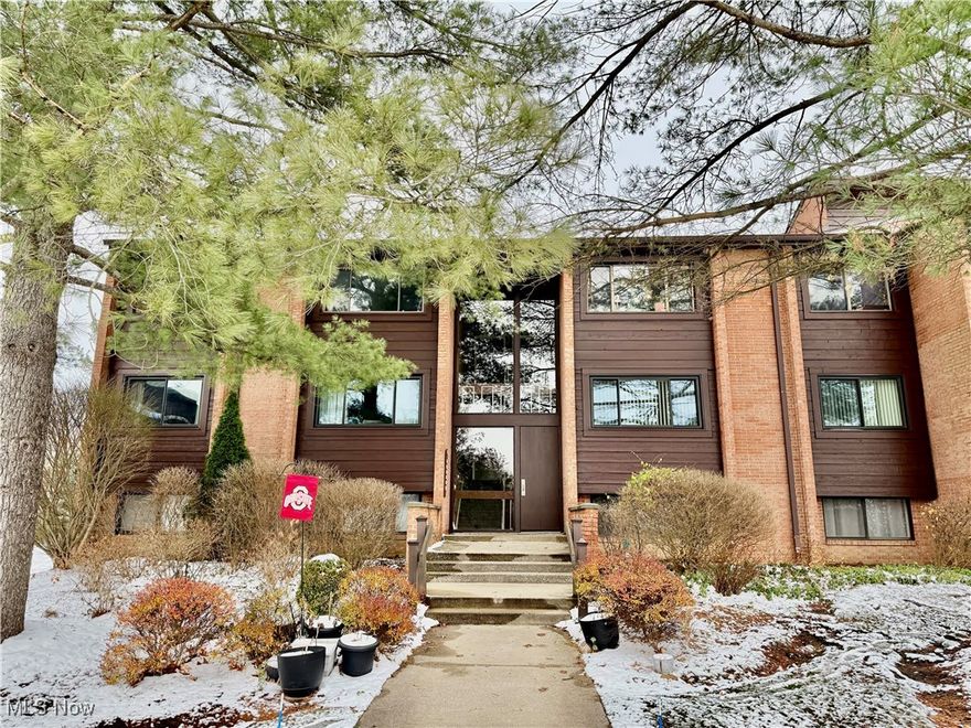 Check out this new condo listing in the highly sought after community of Greenwood Village. The property is nestled against the Cuyahoga Valley National Park & Cleveland Metropark trails. This second level unit offers 2 BR & 2 full baths & has been lovingly cared for by the same owner for the past 31 years.  You'll be impressed by the spacious living & dining space that is graciously lit by the sliders leading to the large balcony.   Kitchen is ample size with plenty of cabinetry & counterspace.  All appliances stay! Primary suite with full wall closet & private bath.  There is an additional bedroom & full bath.  In suite laundry located in hallway.  Relaxing balcony for those warmer days.  Storage room off balcony along with 2nd utility/storage room.  Spacious closets & additional lockers in garage. 1 reserved parking space included inside garage. Extra open parking in lot.  Just add your personal touch with flooring & decor to make it your own.  Organized Community with Social Events should you choose to participate. TWO pools, one indoor, one outside. Tennis, Playground, Fishing Pond, & large Club House with party rooms/ full kitchen. Retail, dining, community services all nearby. Come see for yourself what this spacious condo and Greenwood Village has to offer.