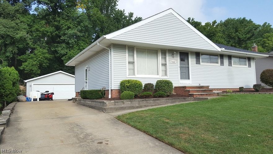 Adorable 4 BR, 2 BA Ranch with all you could possibly need! Newer siding/roof and nice details throughout. Spacious Eat-In Kitchen with stylish tile back-splash, Formal DR or eating area, sliding doors lead to the wide-stretching deck to enjoy backyard, private views; this home doesn’t skip a beat! Natural light pours into the Large Great Room. First floor has Master BR and 2 additional BRs, and a tiled Full Bath. The Lower Level includes completely finished rec room w/ wet bar and cabinetry, Laundry/Workshop area w/built-ins, and an office space. 4 Car Garage and amenities, amenities, amenities! Award-winning Nordonia Schools. Close to everything! Call today for your showing.