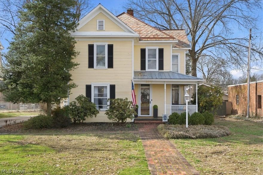 If you’ve grown weary of cookie-cutter homes and long for something special, this Vienna gem is exactly what you’ve been waiting to find. Gracefully set back from the road, this beautiful two-story home welcomes you with a half-wrapped porch and a swing that seems to whisper an invitation to stay awhile. Step inside and to pocket doors, rich wood floors, soaring ceilings, sparkling chandeliers, ornate mantels, and intricate trim that creates a sense of timeless craftsmanship that is rarely found today. Every room offers something to admire, including a classic clawfoot tub. The kitchen blends character with modern touches, featuring granite countertops, stainless appliances, and decorative shelving that feels both stylish and inviting. Beyond the back door lies a setting that feels like your own private escape. The backyard unfolds into a peaceful place with an arched patio softly illuminated with accent lighting, beautiful garden plantings, and a pergola draped in trailing blooms to come. An old barn stands proudly nearby, adding a touch of rustic nostalgia and making the entire property feel as though you’ve stepped back in time. Offering three spacious bedrooms, one and a half baths, a double garage, and nearly half an acre of level land, this property is more than just a home—it’s an experience. It’s the kind of place that stirs something in you, where every corner holds a new detail to discover and every space invites you to imagine the life that could unfold here. All of this and a location that is just steps from the country club and golf course.   Tour it today!