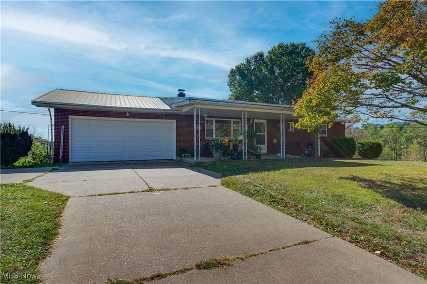 Ranch Home on 10.56 Acres in Washington, WV – Your Dream Farmhouse Awaits!

Discover the charm of country living with this delightful ranch home set on a sprawling 10.56-acre recently surveyed farm in Washington, WV. This property is a perfect blend of comfort, functionality, and rural tranquility.

The home features 3 bedrooms, 2 full bathrooms, and versatile bonus rooms that can be tailored to your needs—whether you desire an office, dining room, or craft space. The spacious family room in the basement is a cozy retreat, complete with a wood-burning fireplace and convenient rear walk-out access. Step outside to the covered rear deck for al fresco dining or unwind on the front porch swing, soaking in the serene views.

For those with agricultural aspirations, the property includes two barns, a machine shed, a storage shed, and a fenced-in pasture with a pond—perfect for livestock or hobby farming. A Generac generator ensures you’re prepared for anything, adding peace of mind to your country lifestyle.

As an added bonus, the sellers own 50% of the mineral rights and will convey them to the new owners, offering additional long-term value. With some updates, this could be the idyllic farmhouse you’ve always dreamed of. Don’t miss out on this unique opportunity to embrace the beauty and simplicity of rural living in West Virginia!  The sellers will also consider selling the house with less acreage.