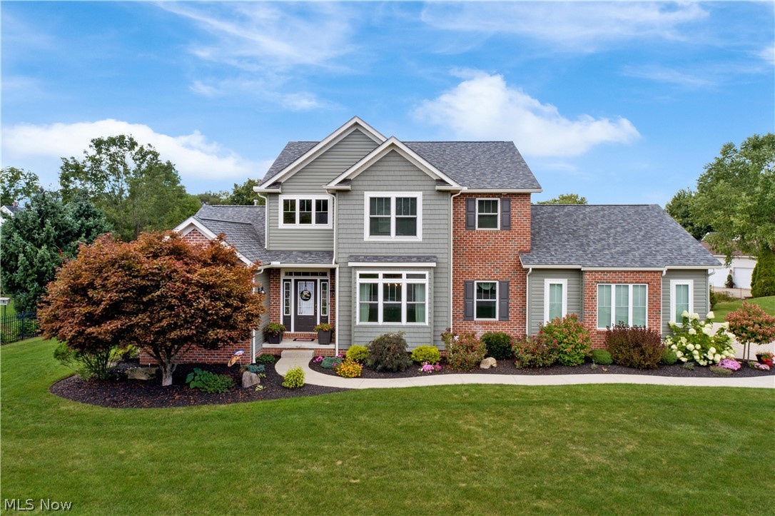 WOW! Bring your things with you to the showing because you will not want to leave once you get here! This home is move-in ready with absolutely nothing to do. As you enter this wonderful home you are greeted in the remarkable two-story foyer that leads you into the Great Room which is beautifully designed with a stone-faced gas fireplace and highlighted by a wall of windows. The foyer is flanked by a formal dining room to the right and a sunny office/study on the left. The kitchen has all the modern conveniences with stainless steel appliances including a convection oven/range, and breakfast bar. The kitchen opens to a bright sunroom giving you a place to start your morning or relax after a long day. Also situated on the main floor is a powder room and laundry room tucked away near the 3-car side-load garage. To finish off the first-floor appointments the Master Suite is completed with an architectural tray ceiling and a wonderful en-suite with a walk-in closet. On the second level, y