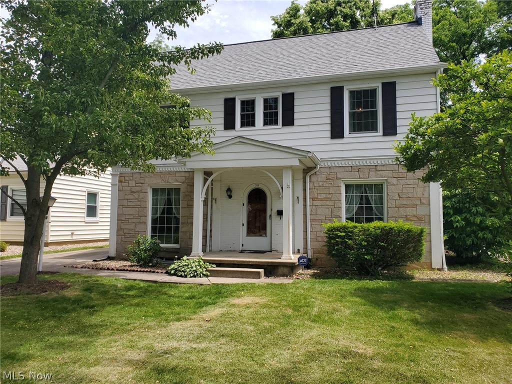 Charming 3 bedroom colonial with spacious living room, formal dining room, applianced kitchen with dining area, family room for gatherings and a half bath all on the first floor. Second floor has the master bedroom with 2 other bedrooms as well as the full bath. One bedroom has access to unfinished attic space. Full basement with area that could be a rec room and another area for mechanicals and storage. Character galore from the arched front door, covered front porch, built-ins, hardwood floors & so much more. Enjoy summer in the open & airy enclosed porch or in the private, treed backyard. Updates include: windows (2022), refrigerator (2020), roof (2019), furnace & air (2018), & waterproofed basement with transferable warranty (2016). Live on a great street and be close to parks, shopping, and so much more!