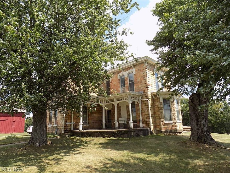 Great location for Mini Farm approximately 6 acres with about 650 ft of rd. frontage on St. Rt. 147, just past Barnesville Corp, limits. Features a beautiful Victorian home with 4 Br, 1.5 Ba. The rooms are spacious ,with hardwood floors and beautiful woodwork and,10 ft. ceilings.
The exterior trim was painted 2016, septic and roof, replaced 6-8 years ago ,as per owner. Three partially  covered porches are 17 x 17 , concrete. The red barn, garage  ,carport, and shed, could make a mini horse farm, the ground is rolling, there is a wooded area between main rd and property , that makes this property private yet near shopping, restaurants, schools, and in the community of Tacoma. Property will be specified in the deed for residential use only. Property needs survey to be completed soon.