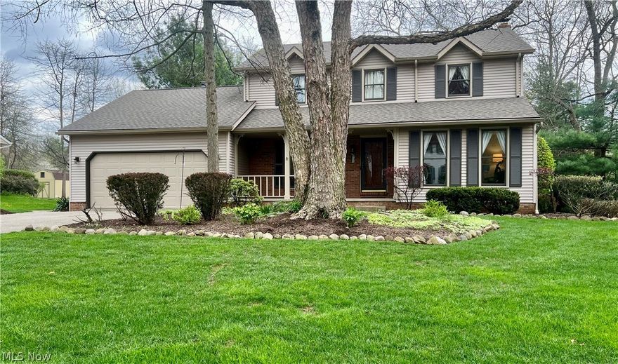 Welcome to 4227 Bunker Lane, a beautifully maintained home in the highly regarded Stow–Munroe Falls City School District. This inviting 3 bedroom, 2.5 bath property offers standout curb appeal with freshly painted exterior trim (2025), manicured landscaping, and low maintenance aluminum siding. Inside, warm oak trim and solid oak doors create a timeless feel, complemented by a cozy fireplace with gas logs and newer kitchen appliances. The finished basement expands your living space and includes a battery backup sump pump along with two generous storage rooms complete with shelving. Step outside to a large, secluded backyard designed for relaxation and entertaining. A concrete patio with a natural gas grill hookup, plus a deck with storage underneath, provides multiple outdoor living options. The heated garage is a true bonus, featuring a Reznor gas heater with thermostat, a utility sink with hot and cold water, a floor drain, a hose bib, and attic access with plywood flooring, shelving, lighting, and power—ideal for hobbies, projects, or extra storage. Additional conveniences include an in ground sprinkler system with a deduct meter and a laundry area conveniently located off the main bedroom. Thoughtful upgrades, practical features, and meticulous care make this home truly move in ready.