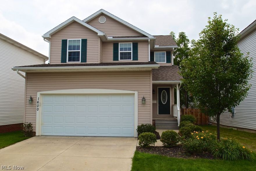 Rare, beautiful, newer construction, colonial home with an open floor plan that sits on a great street in Mayfield Heights.  The home was just built in 2011!  This open floor plan has a beautiful kitchen with granite counter-tops, stainless appliances: refrigerator, stove, microwave, and dishwasher that all stay!  The first floor has the open floor plan with crown molding throughout and tons of natural light!  The second floor has an oversized Master Suite with separate his + hers walk in closets and a rare coffered ceiling.  The master bedroom walks into the Master Bath that has dual vanities, large standup shower and updated lighting!  The second full bath is upstairs, updated, and perfect for guests!  There are two additional bedrooms upstairs, one with a large walk in closet and the other with a large bi-fold.  The huge, partially finished basement is the perfect man cave, rec room, or movie room.  This lovely home also has a Carrier HVAC system, updated light fixtures, all major r