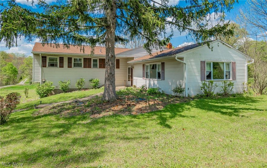 Welcome to 2954 Northampton Road, a spacious retreat nestled across nearly three acres of lush landscape! This enchanting ranch-style home presents boundless opportunities, boasting 4 bedrooms, 2 bathrooms, and a myriad of desirable features. While this home holds immense potential, it awaits your personal touch and vision for updates and renovations. Discover endless possibilities within the heart of the home, where the expansive kitchen beckons with its abundant counter space and storage, perfect for culinary enthusiasts and social gatherings alike. Entertain with ease in the sunken living room, offering a cozy ambiance for gatherings or serene evenings by the fireplace. Explore further down the hall to unveil the convenience of a first-floor laundry, ensuring seamless completion of daily tasks. The spacious master suite awaits, complete with a full bathroom for your ultimate relaxation and privacy. Step outside onto the inviting deck, where panoramic views of the sprawling grounds await, offering a tranquil oasis to unwind amidst nature's embrace. This property epitomizes the perfect blend of comfort, functionality, and tranquility, providing an idyllic canvas for creating cherished memories. Notable updates include a new roof in 2022, disposal in 2023, refrigerator and HWT in 2019, hall bathroom vanity, sink, and toilet replacements in 2019, master shower and toilet upgrades, and LVP flooring installations in 2019. Embrace the opportunity to infuse your personal style and make this your dream home! Schedule your private viewing today to explore the potential of this remarkable property.