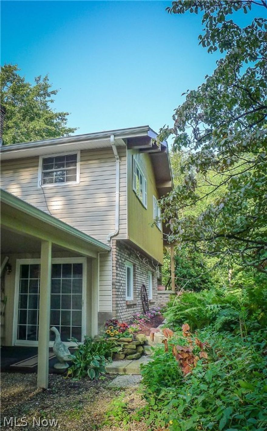 Enjoy this move in ready home on an acre of wooded land in the country. 3 bedrooms, 2 full baths, 1,500+ finished sq ft, and many updates throughout. Open living room, dining room and kitchen, cozy lower level family room with a fireplace, and an additional room that could be used as an office or an additional bedroom and a full bath. All 3 bedrooms and a full bath are located on the upper level. Enjoy the backyard on the new 24x12 deck. Two car attached garage, carport and a covered patio. Unfinished lowest level could easily be finished for additional living space. Wiggins Street School. Buyers incentive – If property goes into contract on or before 11/30/2017, seller’s will credit buyer $4,000 and also buyer’s agent $1,000 additional commission.