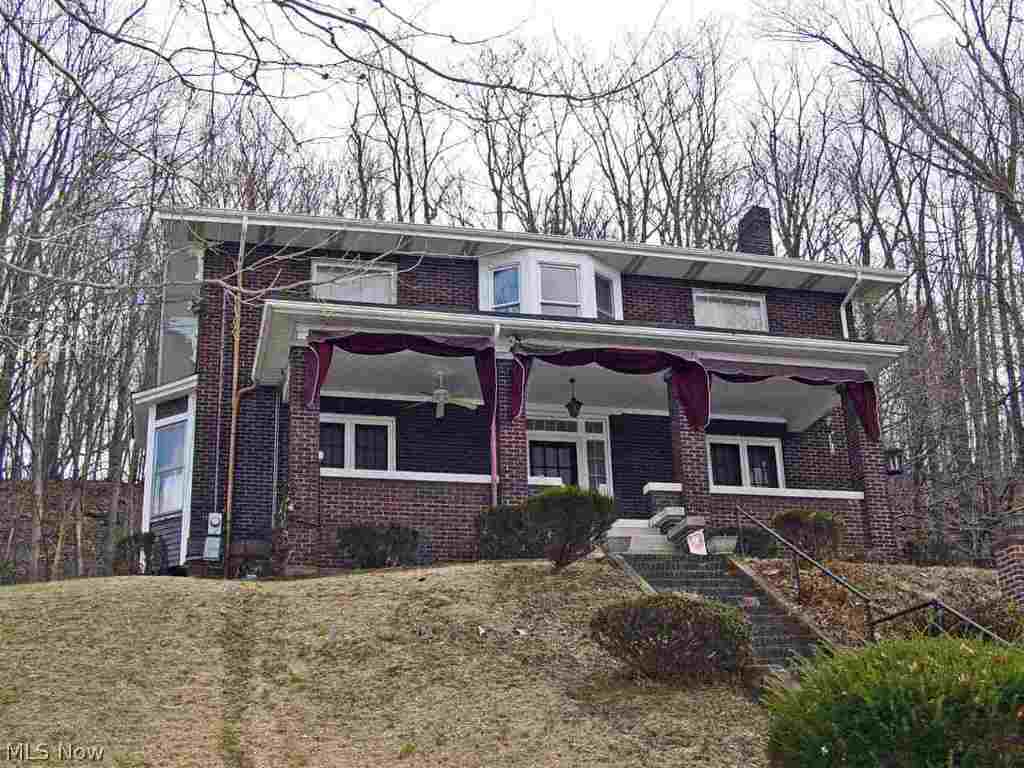 Stately 4/5 BR Victorian with charm & appeal. Almost 3000 sq. ft. with 2 kitchens, large rooms. Huge covered front porch. Conveniently located. Privately situated on a large lot. You'll love the setting!