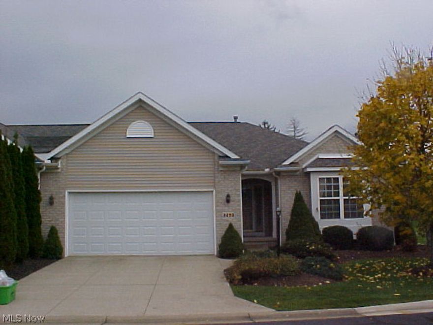 Ranch Cluster Home with open floor plan, large kitchen with breakfast bar.  Master bedroom with walk in closet, master bath with garden tub and walk in shower.  First floor laundry with laundry tub and cabinets.  Finished basement with possible workshop area.  Golf course and pond view.  One year  America's Preferred Home Warranty included.  Ready to move in.