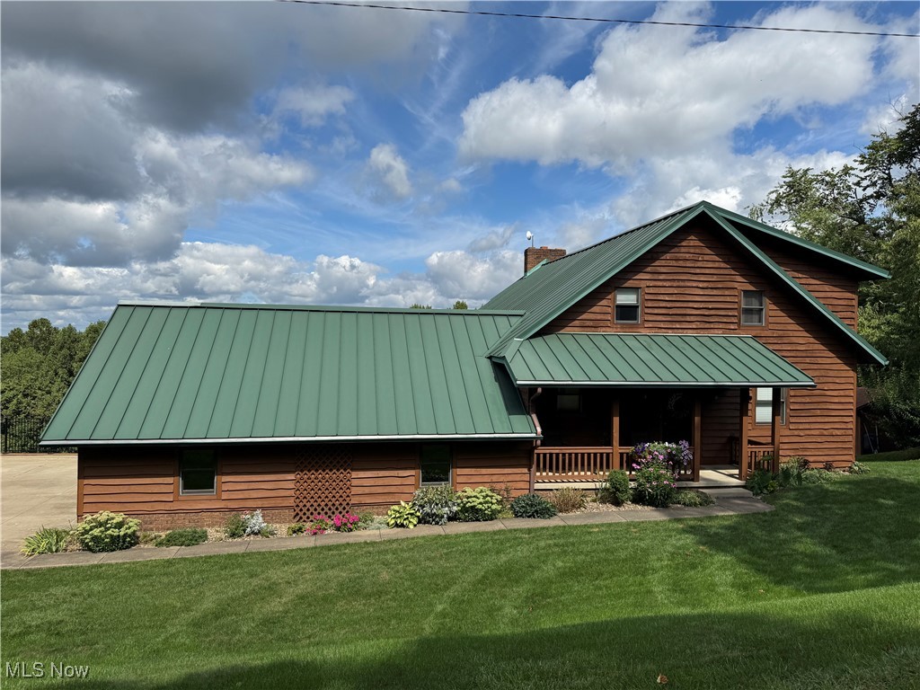 AUCTION A great offering between Berlin and Millersburg! Situated on over 6 acres, this 3-bedroom 1.5 story home has approx. 1800 sq ft of living area, was built in 1988 with updates since. The main floor has a custom kitchen that is fully equipped with like-new appliances. The home has an open concept which includes a breakfast area, dining room, and family room with fireplace.