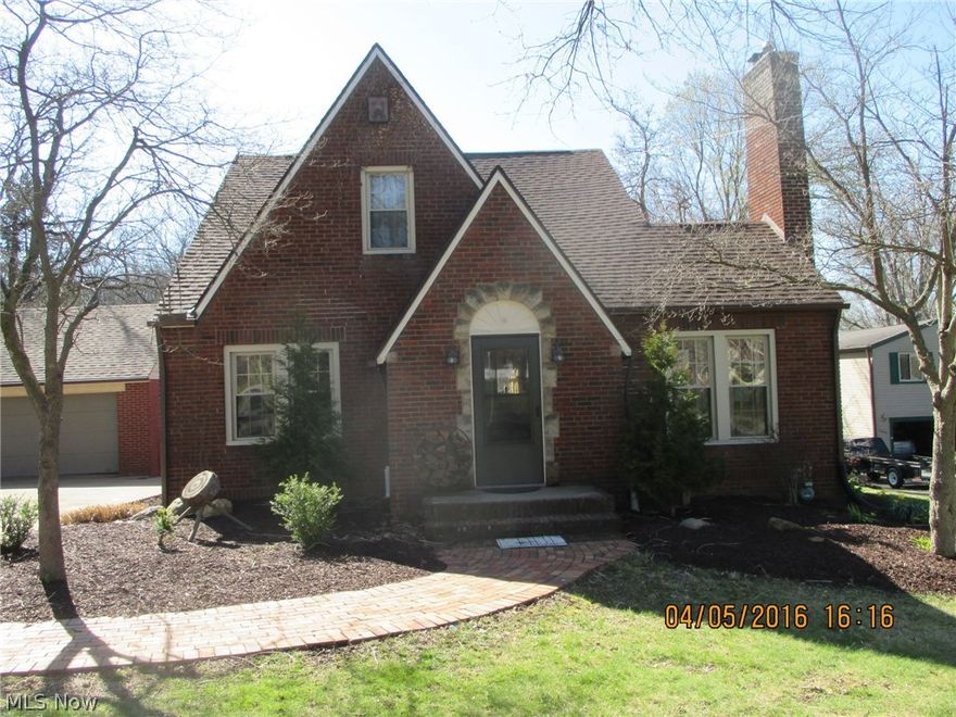 Brick Cape with more than you would think; updated roof, gutter and drain spouts, over-sized 2 car detached garage.  Huge lot with room for the kids or pets.  And once you take in the outside you won't believe how big the inside is!  Large open floor plan, newer kitchen with appliances, 2 nice size bedrooms and full bath on the first floor; and then there's the master suit with room for a sitting area, 2 walk-in closets and a good size bathroom.  You say you want more!  How about a walkout basement?  Easy to finish into whatever type of room your heart desires.
Nice landscaping and storage building in the backyard.