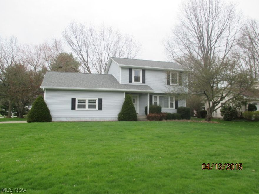 3 bedrooms, 1.5 baths.  Family room features a wood burning fireplace, built-in cabinets, bar, and sliding glass door to back yard.  Kitchen features range, refrigerator, dishwasher, microwave and garbage disposal.  One year home warranty included.  Reduced.