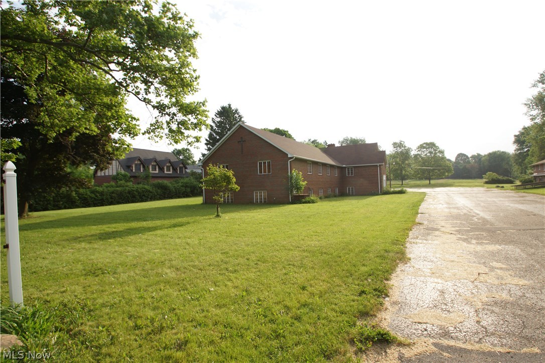 This 8.5 acre property would make a great development opportunity. Zoned R-2 “Multi-family” (or R-1 “Residential”) and R-C “High Density Multi-Family”. Brick church with finished lower level banquet room, all brick home and covered, outdoor pavilion are currently located on the property. Close to amenities, city of Kent and Kent State University. Call agent for additional details.