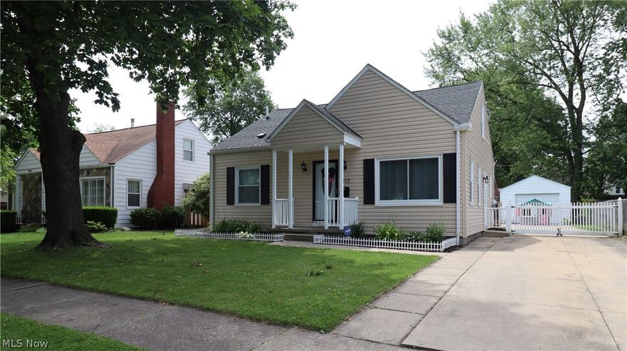Wow! Look no further! This 3 bedroom, 2 full bath adorable bungalow in Cuyahoga Falls has it all! Many features and updates include:  Charming arched doorways, recessed lighting and numerous built-ins for extra storage.  Updated and fully applianced eat-in kitchen with sliding glass doors leading to the newer deck and patio.  Amazing finished lower level family room with new gorgeous built in bar, sink, refrigerator, freezer and full bath with shower.  Roof, siding, picture window, sump pump, hot water tank, bedroom carpet, living room flooring, patio, extended deck and finished rec room all new in recent years. The large fenced in backyard with shed and garage make this the perfect home!  Call today for your private showing! This one won't last!