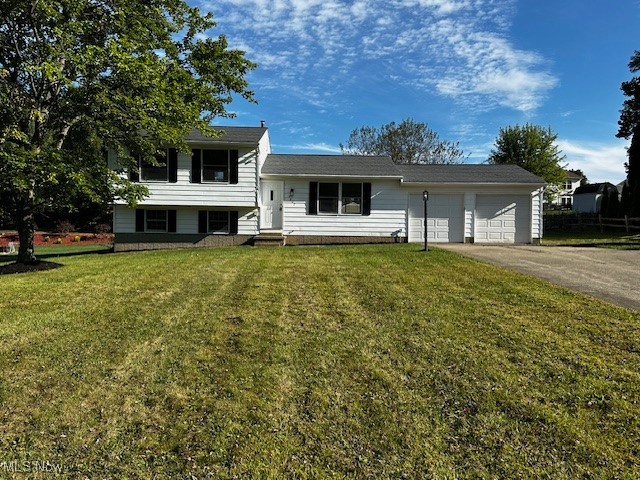 Looking for country style living with all the suburban amenities just minutes away? Who isn’t?? Literally, this home is the best of both worlds! Room to roam, fresh air and ever needed peace and quiet is the backdrop to your new home. Sitting on a beautiful country lot this cozy home offers everything needed to enjoy life. Inside you will be pleased to discover a full-sized kitchen complete with new flooring and a suite of stainless steel appliances. The front family room boasts brand new flooring and a huge picture window that lets all that country sunshine in! The three spacious bedrooms are all highlighted with brand new carpet and a fresh coat of paint. The lower-level is massive and it too has new flooring and fresh paint…so much room here to accommodate any ideas you may have to make this home your own! The backyard is beyond beautiful! Imagine a green space that is large enough for a veggie garden, an outdoor BBQ, a shed (or two) or maybe ALL of these! And with all shopping to enhance the outdoor OR indoor spaces just minutes away, what is not to love? Offering all the peace of the country and all the amenities of suburbia…this home really is the BEST of both worlds!