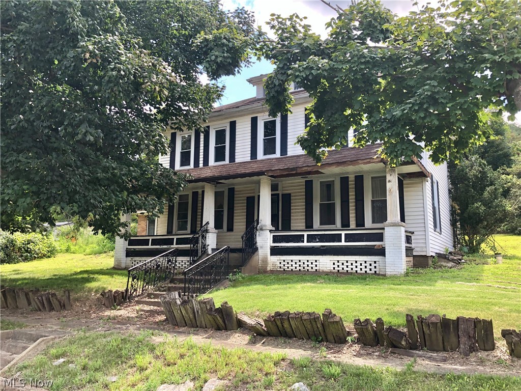 Endless possibilities in this fabulous location. Bed and breakfast, nursing home, restaurant, or just restored to a beautiful home again. Two extra lots on both sides of the home for extra building or parking. Call today to view