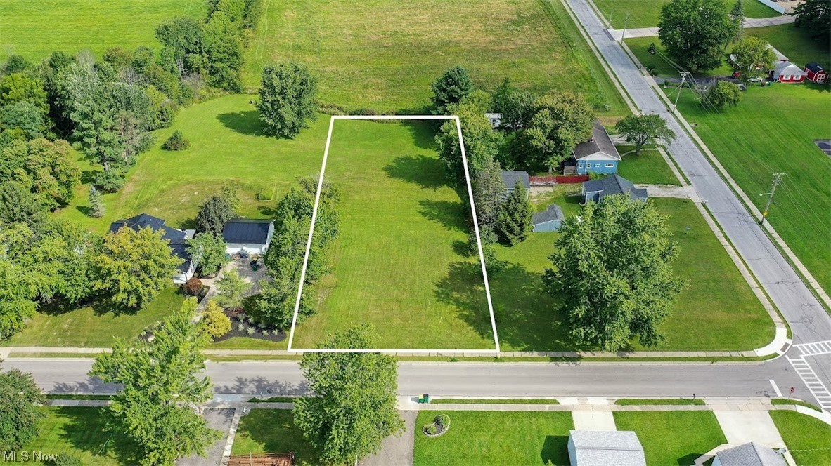 This is a very nice large lot in Middlefield Village where you are able to build your dream home on. This property is conveniently located close to the school and all your shopping, banking, dining etc. needs. The curb is already prepared for the driveway, ready for you to build. Public utilities include: Public water & sewer, cable, electric, gas, and phone lines. THIS PROPERTY TO BE SOLD AT AUCTION on WEDNESDAY, SEPTEMBER 20, 2023 at 5:30PM. Seller has the option to accept offers prior to the auction. REAL ESTATE AUCTION TERMS: 10% nonrefundable down payment day of auction. Balance at closing. (Closing 30-45 days.) NO BUYER’S PREMIUM! Property will sell as is. All desired inspections must be done prior to bidding. This property is to be sold with no contingencies. All the information contained herein was derived from sources believed to be correct.