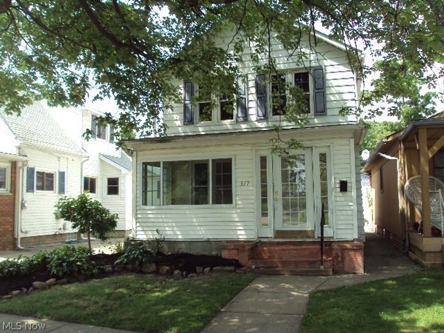 THIS IS A FANNIE MAE HOMEPATH PROPERTY.  Enjoy the view of the park from the front sun room/enclosed porch & a Lake Erie view in the back of the property.  Kitchen with oak cabinets, family room and dining room combination.  There is one bedroom on the first floor and two additional bedrooms on the second floor with an updated full bathroom.  Enjoy the the back patio area.  Newer windows and doors.  Nicely landscaped in the frontyard.  There is no drive for this home so parking is on the street.