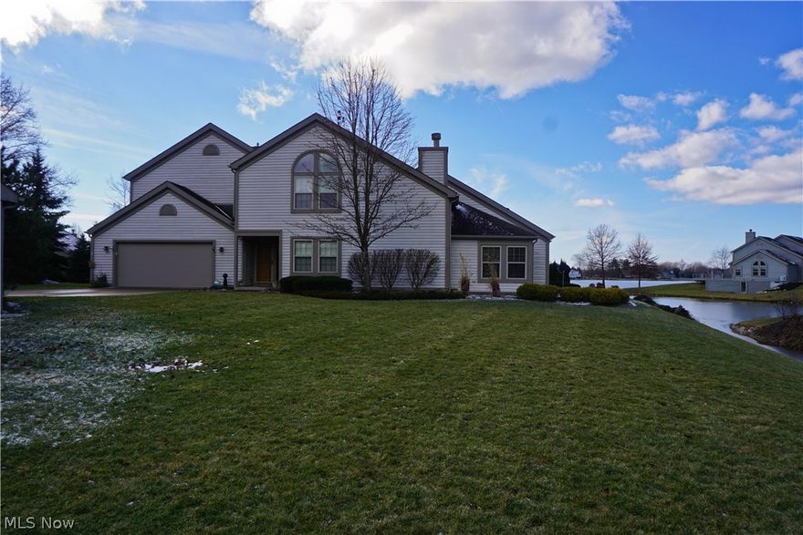 Ask about $0 down  USDA financing!!! Located on the inlet, this condo has it all...open spaces, soaring ceilings, a loft, even a 2 sided fireplace with adjoining built-in bookcase, between the great room and sun room! The entry, great room (formal living/dining combo), kitchen (with stainless steel appliances), & sun room all feature gorgeous hardwood flooring. Half bath, on first floor. Upstairs, there is new flooring in the loft and the well thought out, built-in office area! Luxury master suite includes bedroom, large walk-in closet, & luxurious bath. There is, also, a roomy secondary bedroom and another nicely sized full bath. Add to this a very convenient 2nd floor laundry/storage room. Central vacuum. Attached 2 car garage. Beautiful brick paver patio, with a view of lake!