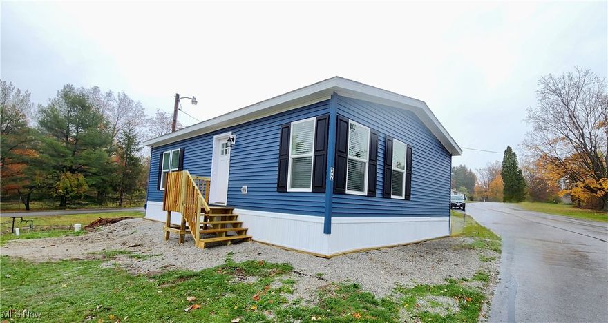 Why settle when you can have everything brand new—at an unbeatable price—in the highly sought-after city of Kirtland? Welcome to Eagle Mobile Home Park, where convenience meets comfort in a peaceful, well-located community just minutes from local parks, shopping, and daily amenities—yet tucked away from the hustle and bustle. This opportunity offers a high-end drywall finished 2-bedroom, 1-bath home allowing someone to step into the freedom of homeownership—say goodbye to the restrictions of apartment living! Inside, you'll enjoy a bright, open-concept layout that blends the eat-in kitchen, center island and living area—perfect for relaxing or entertaining. The tall upgraded cabinets come stocked with all stainless steal appliances. The washer/dryer is also included within its own dedicated laundry room and linen closet. Low maintenance living with more time to enjoy life! This home comes equipped with gas forced air heating and central air. A 12x10 deck will be installed after the new owner installs a shed of their choice. This lot also offers enough space to install a 1 car driveway, if preferred. All new homes come with a 7 year warranty! Pets are welcome (with some restrictions), and park applications are available online. All offers are subject to park approval, and community rules are available to review in advance. Don't miss out on this exciting opportunity—schedule your private showing today for this brand new move in ready home, or contact us for information on additional floor plans and available lots in this fantastic Kirtland location!