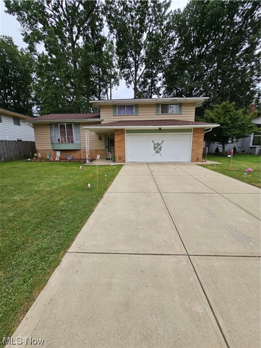 Welcome to this beautiful 4x bedroom, 2.5 bath, 2.5 car garage, Split level home.  4x levels of space. Updated kitchen comes with all the appliances. 4 decent size bedrooms on the 2nd floor. Master bedroom has a master bathroom. Main and 2nd floor bathrooms have been recently updated with a walk-in showers. Formal dining room.  Family room that leads to sliding deck doors to the patio. Recently Partially finished basement with additional space currently used as a bar and work out room. Large well-manicured yard. Recently poured driveway and patio 5 years old.  30-year roof shingle replaced 5x years ago.