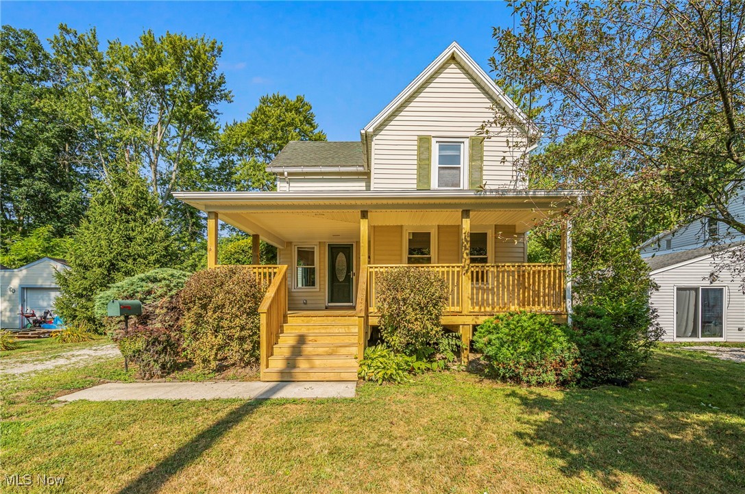 Opportunity knocks at this 3 bed, 1 bath home, in beautiful Geneva, Ohio! Located in Geneva city, close to downtown, in a quiet neighborhood, this home has so much to offer. Walk through the BRAND NEW covered front porch, to the front door. Inside, you'll find a nice size dining room freshly painted in a soothing green. The dining room has a newer picture window that shows a glimpse into the life of a cardinal family, that nest in the bush right outside the window, year after year. The other window in the dinning room, as well as the 3 windows in the living room, have been replaced. The living room has high ceilings and feels very spacious. The Kitchen comes with the refrigerator, oven and built in microwave. Natural wood cabinets surround the kitchen and give it a warm cozy feeling. There is also a breakfast bar and pantry! The oversize full bathroom is on the first floor and is also where you'll find the laundry area. All three bedrooms are located upstairs with electric base board heat and each room comes with it's own window air conditioner. The first floor, however, is forced air heat and has central air, too. The back deck has just been repainted and is ready for relaxing. The large two car garage has plenty of space for storage. The back yard is fully fenced in and comes with a fire pit. Don't wait! This home is begging you to throw your next Grape Jamboree party here!